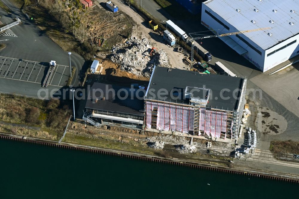 Hannover from above - Construction site for reconstruction and modernization and renovation of an office and commercial building Hannover Docks in the district Limmer in Hannover in the state Lower Saxony, Germany