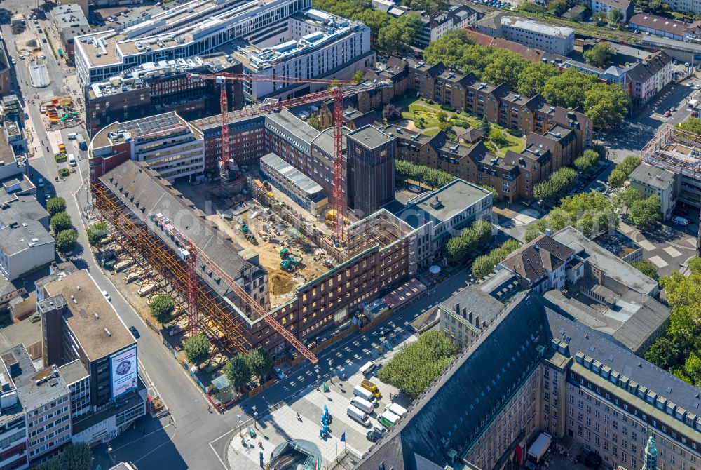 Aerial image Bochum - Construction site for reconstruction and modernization and renovation of an office and commercial building Haus of Wissens (HdW) on place Willy-Brandt-Platz in Bochum at Ruhrgebiet in the state North Rhine-Westphalia, Germany