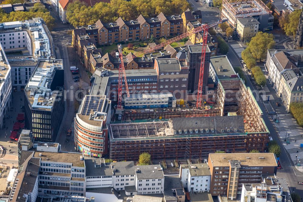 Bochum from above - Construction site for reconstruction and modernization and renovation of an office and commercial building Haus of Wissens (HdW) on place Willy-Brandt-Platz in Bochum at Ruhrgebiet in the state North Rhine-Westphalia, Germany