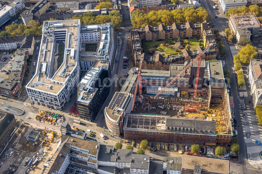 Aerial image Bochum - Construction site for reconstruction and modernization and renovation of an office and commercial building Haus of Wissens (HdW) on place Willy-Brandt-Platz in Bochum at Ruhrgebiet in the state North Rhine-Westphalia, Germany