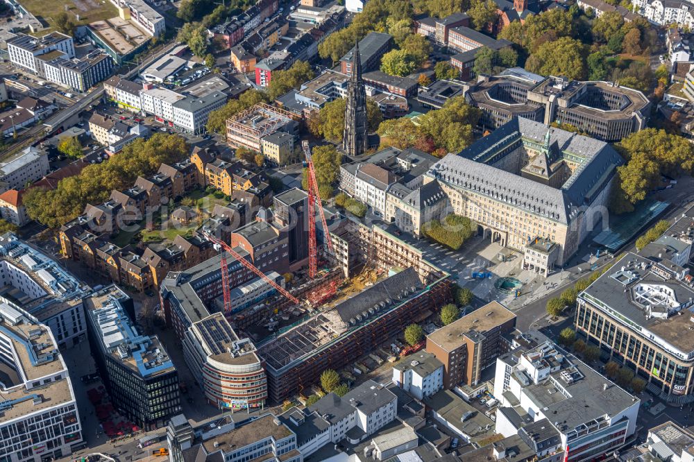 Aerial photograph Bochum - Construction site for reconstruction and modernization and renovation of an office and commercial building Haus of Wissens (HdW) on place Willy-Brandt-Platz in Bochum at Ruhrgebiet in the state North Rhine-Westphalia, Germany