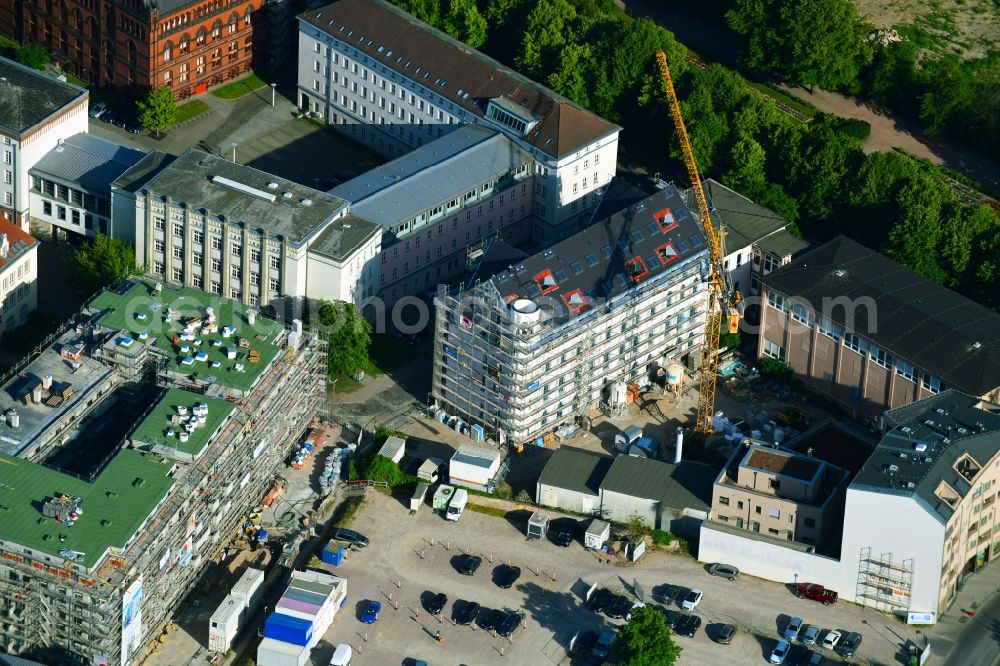 Aerial photograph Rostock - Construction site for reconstruction and modernization and renovation of an office and commercial building Historisches Telegraphenamt between Rungestrasse, Wallstrasse and Buchbinderstrasse in the district Stadtmitte in Rostock in the state Mecklenburg - Western Pomerania, Germany