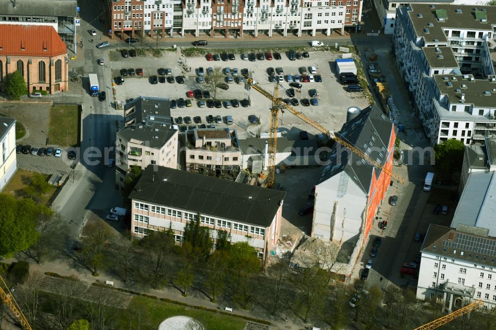 Rostock from above - Construction site for reconstruction and modernization and renovation of an office and commercial building Historisches Telegraphenamt between Rungestrasse, Wallstrasse and Buchbinderstrasse in the district Stadtmitte in Rostock in the state Mecklenburg - Western Pomerania, Germany