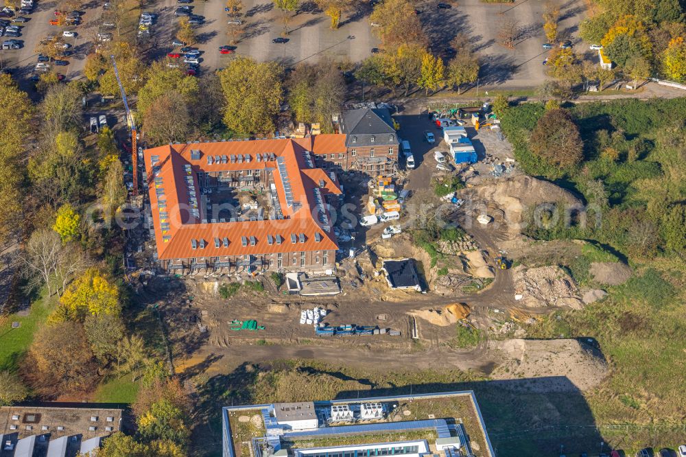 Aerial photograph Bochum - Construction site for reconstruction and modernization and renovation of an office and commercial building Lennershof on Hochschulcampus on street Lennershofstrasse in the district Querenburg in Bochum at Ruhrgebiet in the state North Rhine-Westphalia, Germany