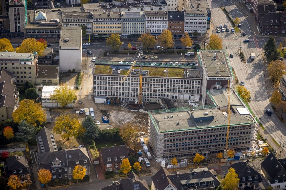 Bottrop from above - Construction site for reconstruction and modernization and renovation of an office and commercial building of RAG Gebaeudes zum Bauknecht Quartier between Boeckenhoffstrasse and Gleiwitzer Platz in Bottrop at Ruhrgebiet in the state North Rhine-Westphalia, Germany