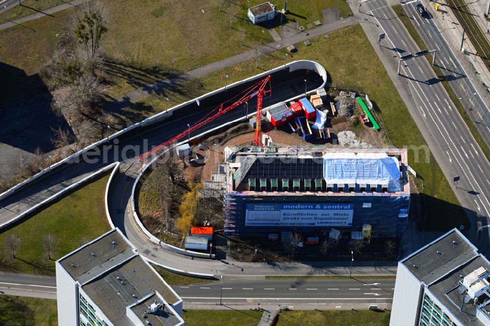 Dresden from the bird's eye view: Construction site for reconstruction and modernization and renovation of an office and commercial building on Sidonienstrasse in Dresden in the state Saxony, Germany