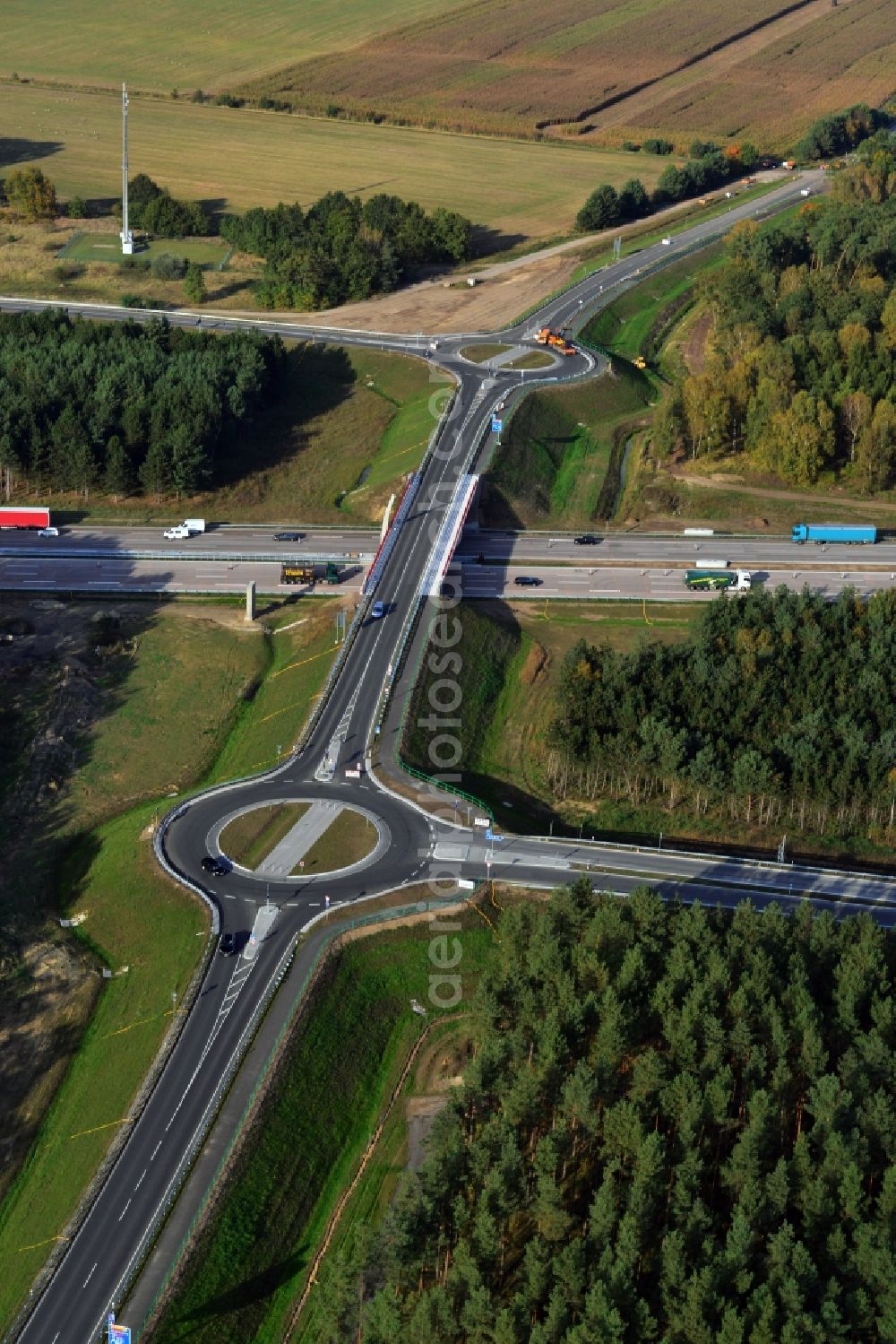 Kremmen from the bird's eye view: Construction site of expansion of the junction Kremmen - Havelland at the motorway A10 and A24 in the state Brandenburg