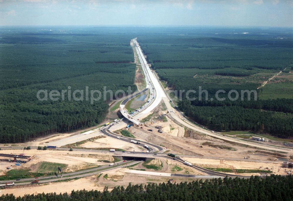 Aerial photograph Zernsdorf / Brandenburg - Umbau- und Erweiterungs-Baustelle des Autobahndreieck Spreeau, ist ein Autobahndreieck am südöstlichen Berliner Ring (A 10), das nach Osten die A 12 nach Frankfurt anbindet.Das Dreieck wurde bereits 1937 erbaut und von 1998 bis 2000 umgebaut. Dabei wurde die Hauptrasse, die A 10, auf sechs Spuren erweitert.