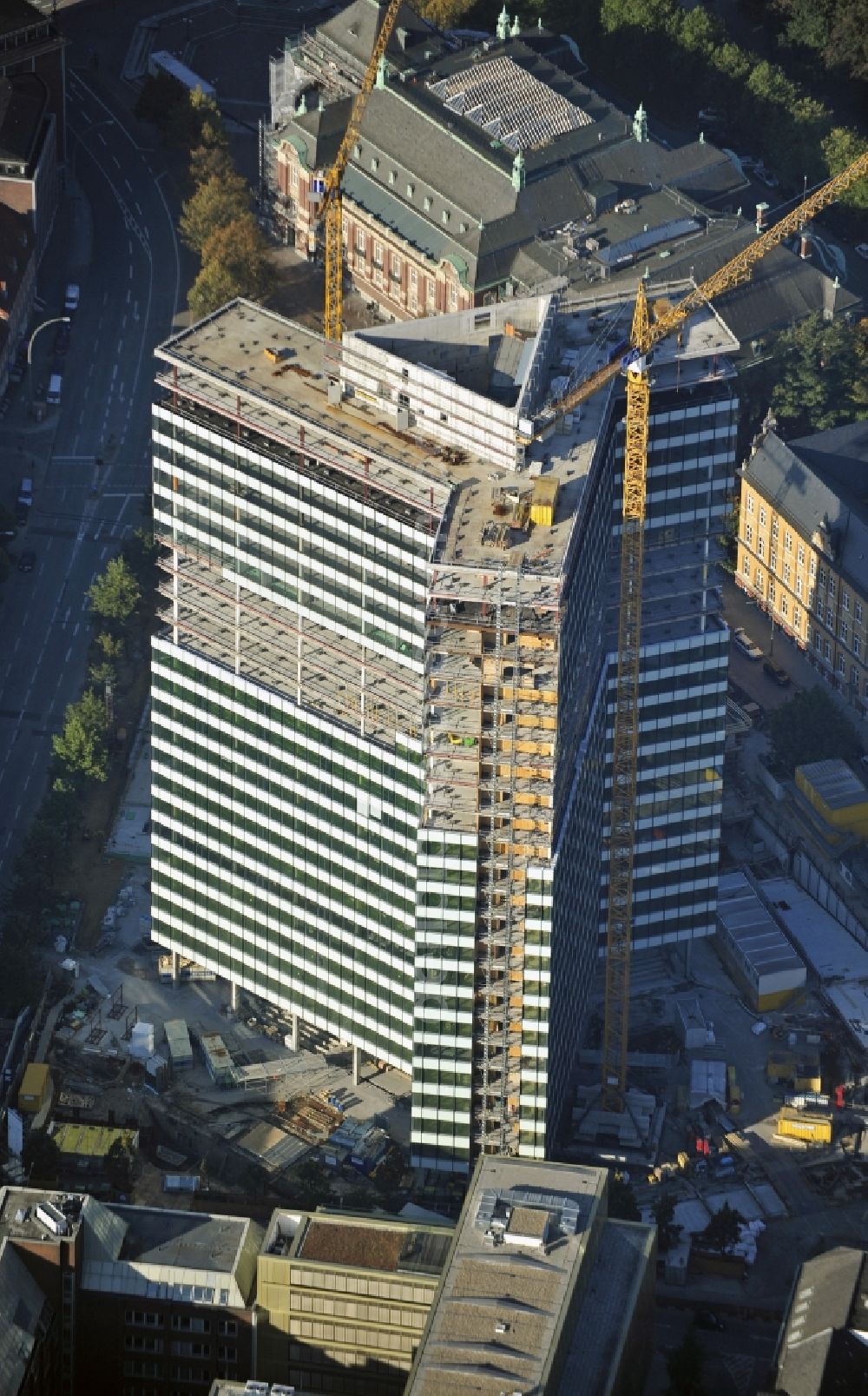 Hamburg from the bird's eye view: Construction site of high-rise ensemble of Emporio-Hochhaus in the district Neustadt in Hamburg, Germany