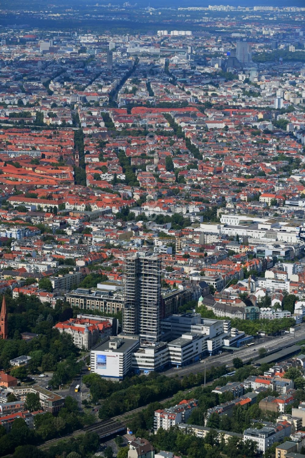 Berlin from the bird's eye view: Highrise building of the Steglitzer Kreisel - UeBERLIN Wohntower complex on Schlossstrasse in the district of Steglitz in Berlin