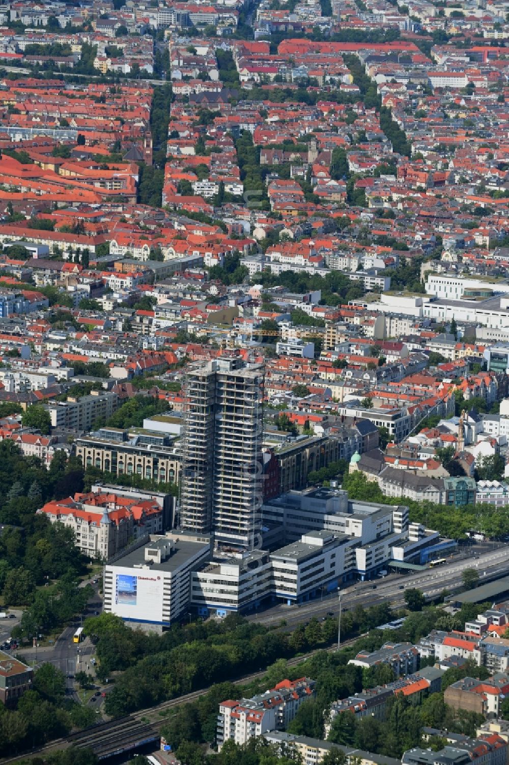 Aerial image Berlin - Highrise building of the Steglitzer Kreisel - UeBERLIN Wohntower complex on Schlossstrasse in the district of Steglitz in Berlin