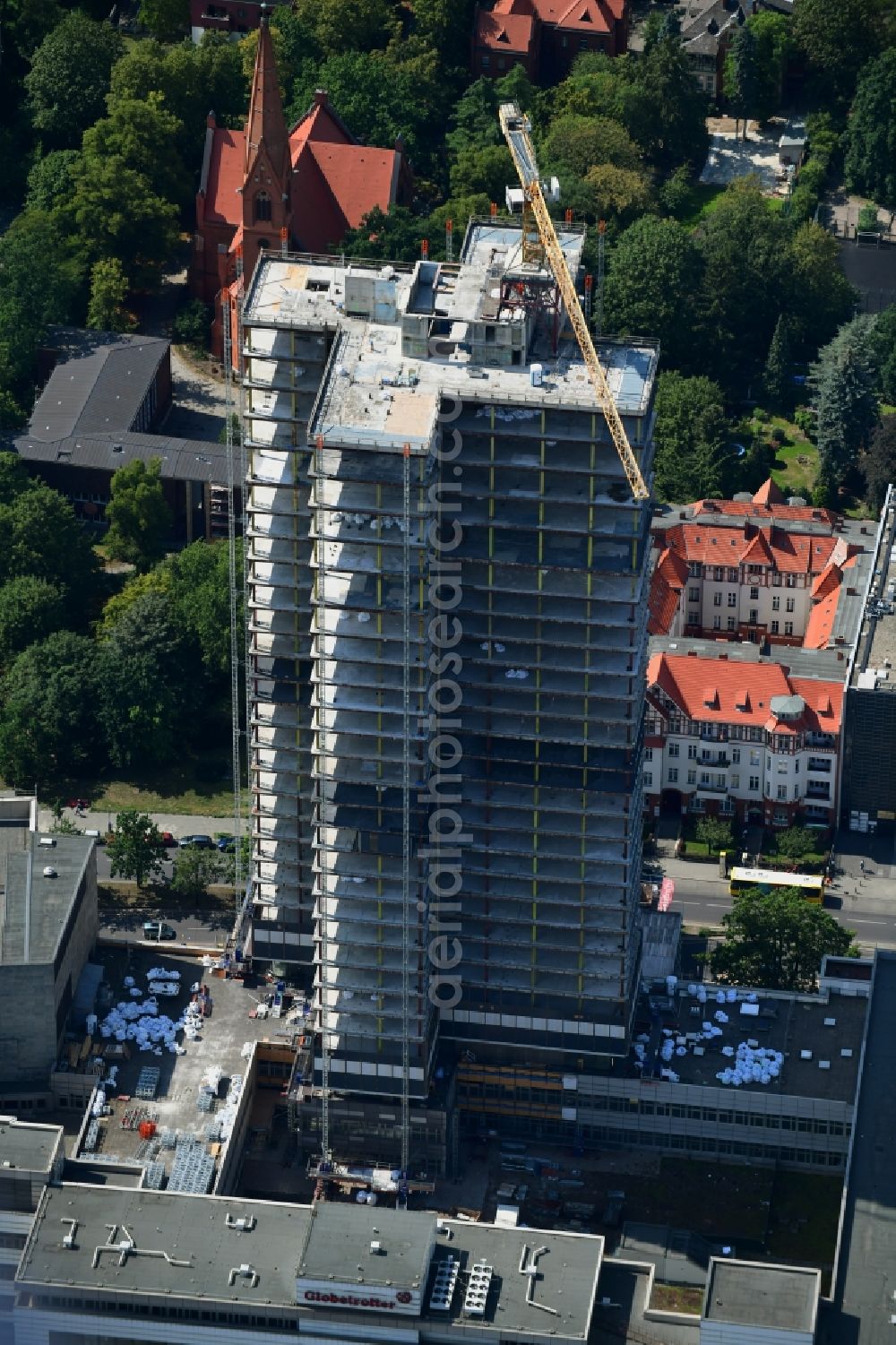 Berlin from the bird's eye view: Highrise building of the Steglitzer Kreisel - UeBERLIN Wohntower complex on Schlossstrasse in the district of Steglitz in Berlin