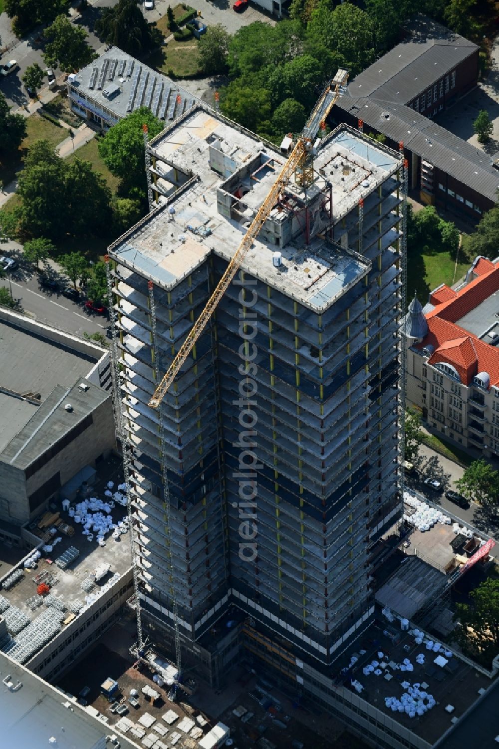 Berlin from above - Highrise building of the Steglitzer Kreisel - UeBERLIN Wohntower complex on Schlossstrasse in the district of Steglitz in Berlin