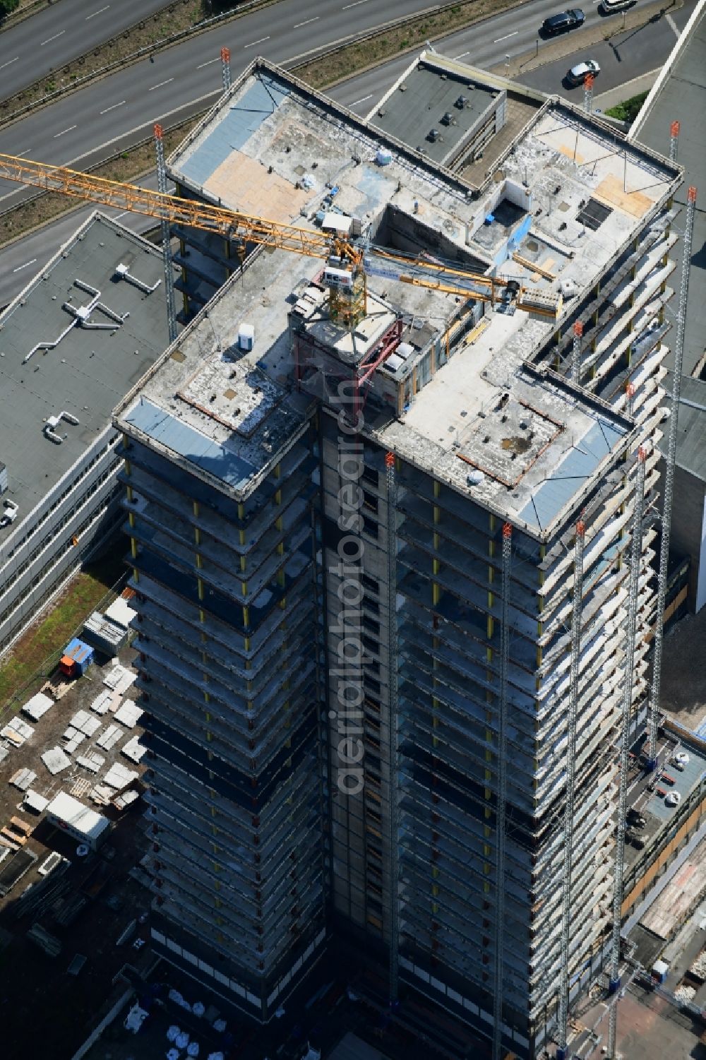 Aerial image Berlin - Highrise building of the Steglitzer Kreisel - UeBERLIN Wohntower complex on Schlossstrasse in the district of Steglitz in Berlin