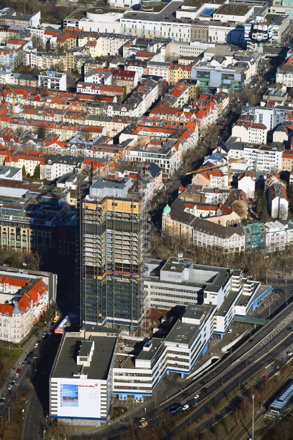 Aerial image Berlin - Highrise building of the Steglitzer Kreisel - UeBERLIN Wohntower complex on Schlossstrasse in the district of Steglitz in Berlin