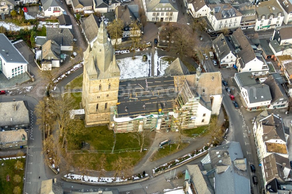 Aerial photograph Brilon - Construction site for reconstruction and modernization and renovation of a church building of Probsteikirche on Schulstrasse in Brilon in the state North Rhine-Westphalia, Germany