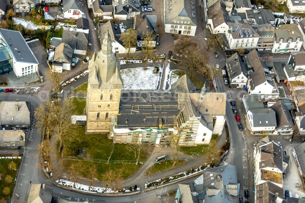 Brilon from above - Construction site for reconstruction and modernization and renovation of a church building of Probsteikirche on Schulstrasse in Brilon in the state North Rhine-Westphalia, Germany