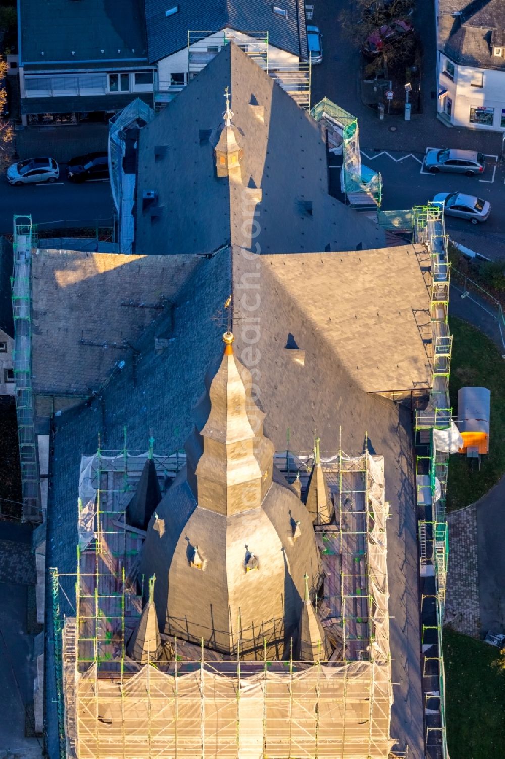 Brilon from the bird's eye view: Construction site for reconstruction and modernization and renovation of a church building of Probsteikirche on Schulstrasse in Brilon in the state North Rhine-Westphalia, Germany