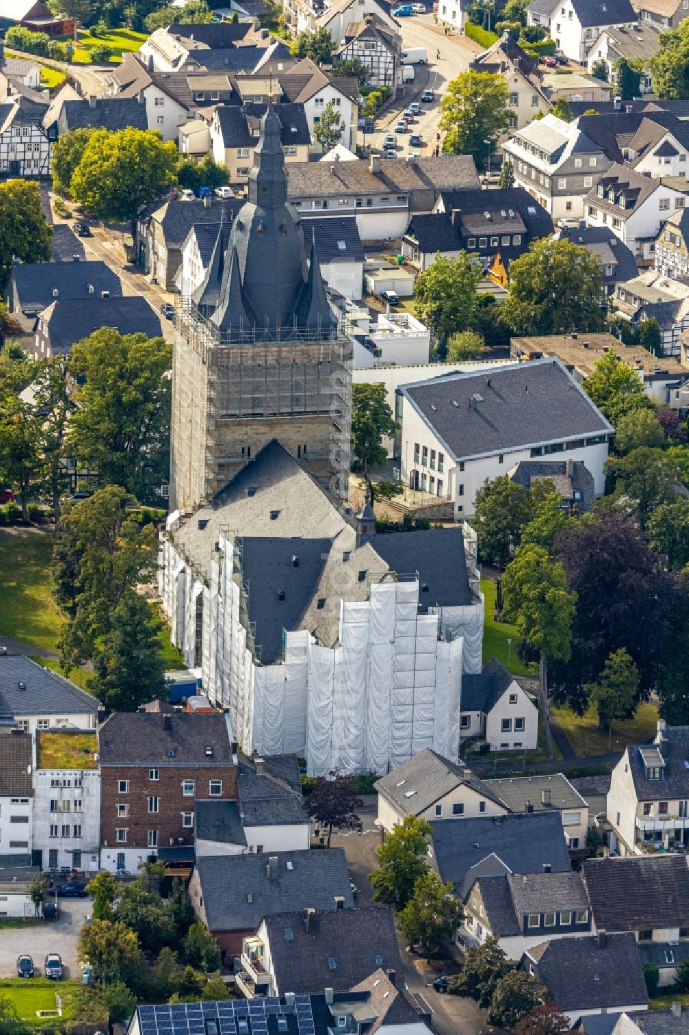 Aerial photograph Brilon - Construction site for reconstruction and modernization and renovation of a church building of Probsteikirche on Schulstrasse in Brilon in the state North Rhine-Westphalia, Germany