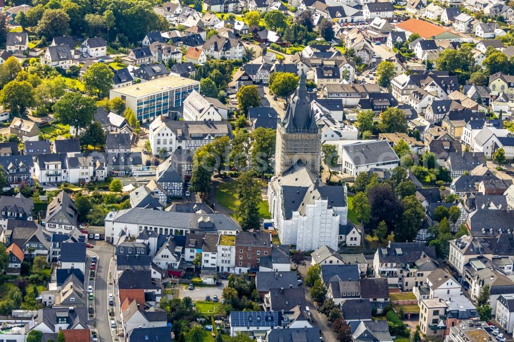 Brilon from above - Construction site for reconstruction and modernization and renovation of a church building of Probsteikirche on Schulstrasse in Brilon in the state North Rhine-Westphalia, Germany