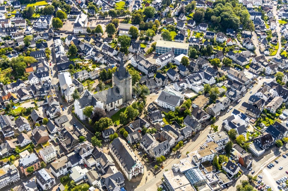 Brilon from the bird's eye view: Construction site for reconstruction and modernization and renovation of a church building of Probsteikirche on Schulstrasse in Brilon in the state North Rhine-Westphalia, Germany