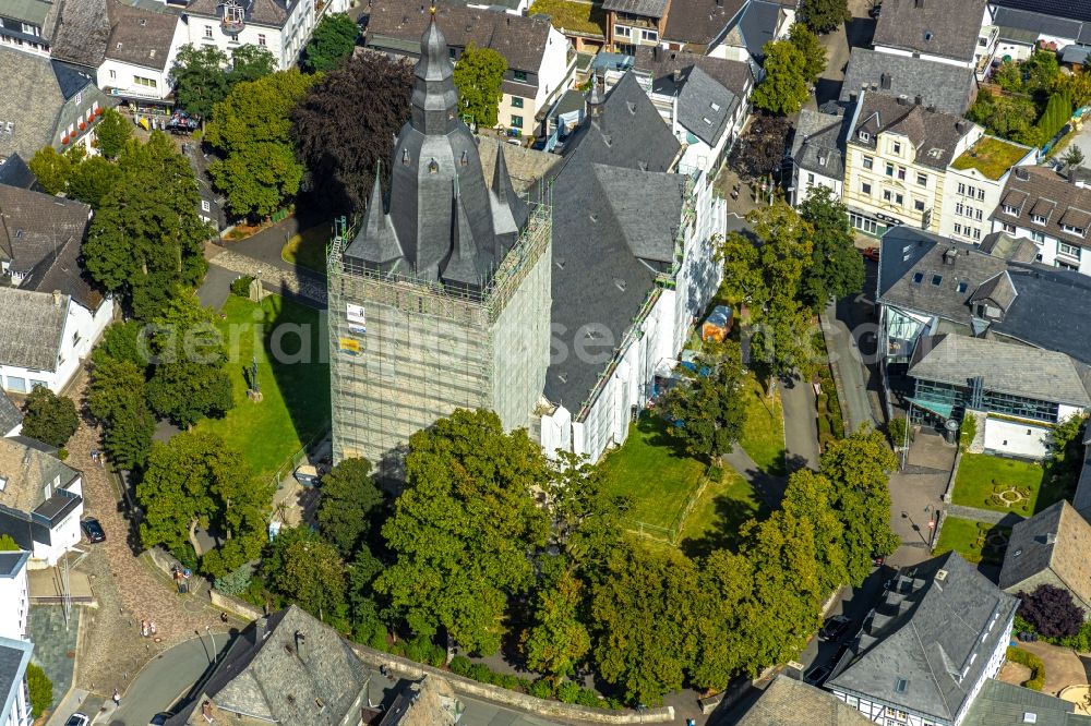 Aerial photograph Brilon - Construction site for reconstruction and modernization and renovation of a church building of Probsteikirche on Schulstrasse in Brilon in the state North Rhine-Westphalia, Germany