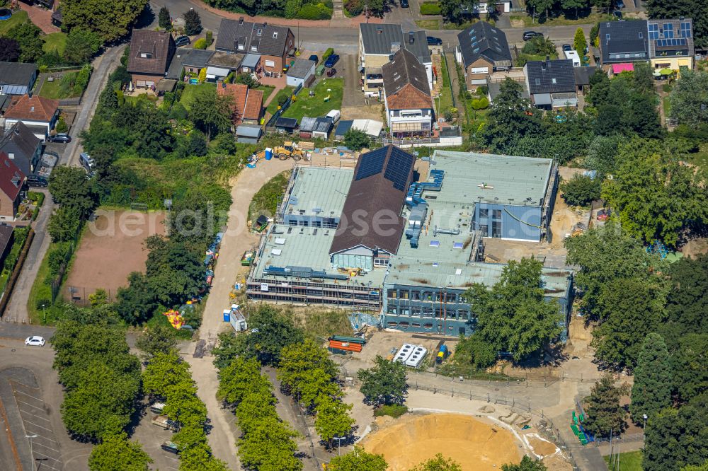 Aerial image Wesel - Construction sites for the conversion, expansion and modernization of the school building Gemeinschaftsgrundschule Fusternberg on street An der Rundsporthalle in Wesel at Ruhrgebiet in the state North Rhine-Westphalia, Germany