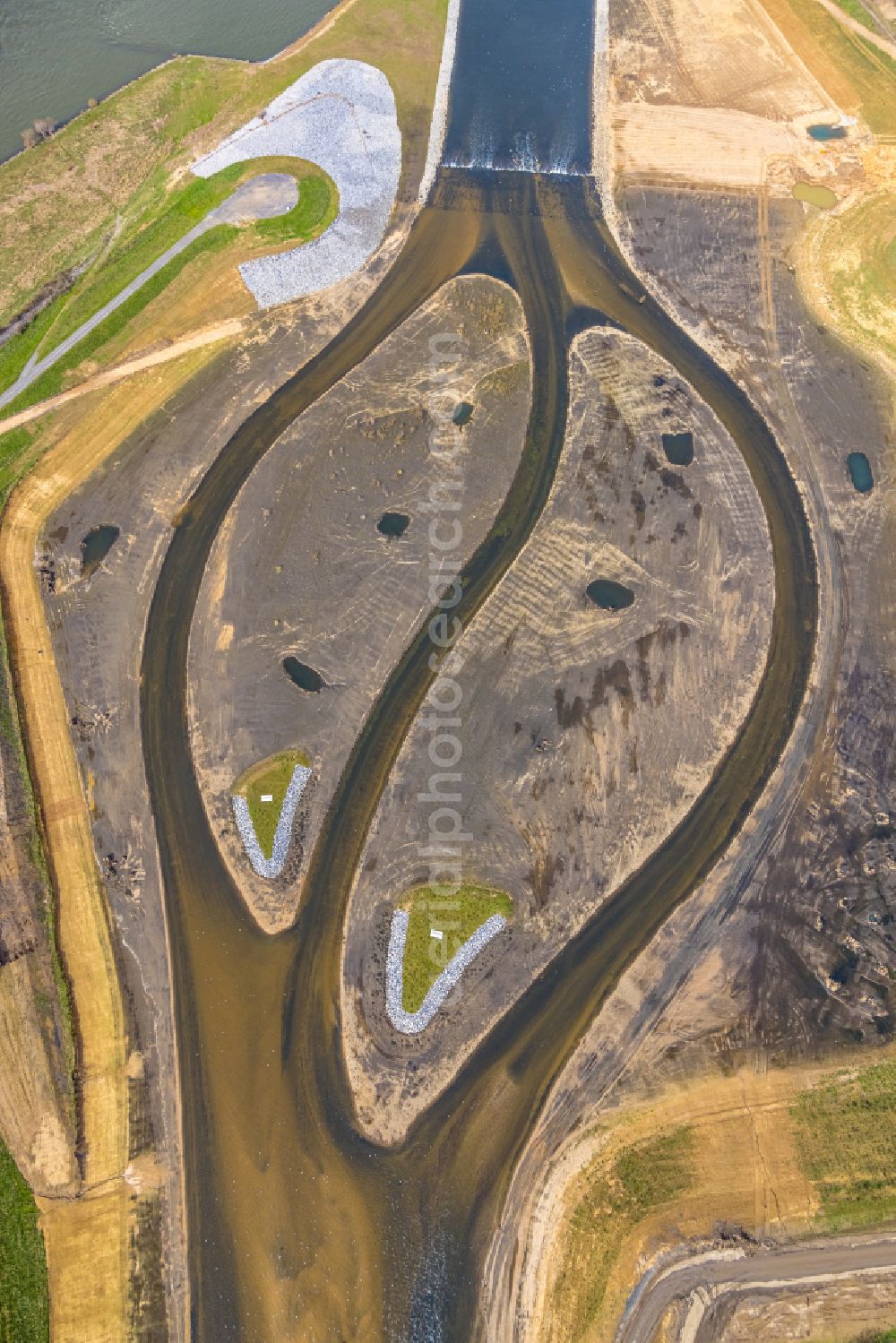 Aerial photograph Voerde (Niederrhein) - Conversion - construction site of the Emscher estuary in the Rhine near Eppinghoven in the state of North Rhine-Westphalia