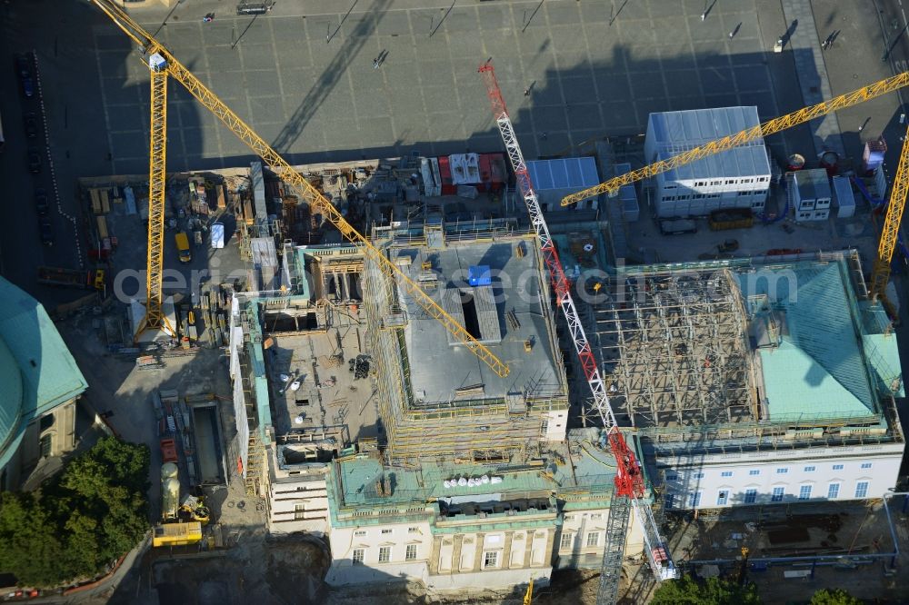 Aerial photograph Berlin - View of the reconstruction and renovation of the building of the Staatsoper Unter den Linden in Berlin at Bebelplatz. It is the oldest opera house and theater building in Berlin. According to the architect HG Merz is a reconstruction of the historical building complex