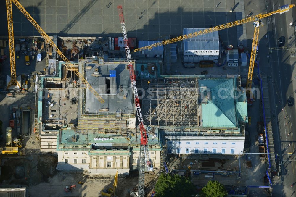 Berlin from above - View of the reconstruction and renovation of the building of the Staatsoper Unter den Linden in Berlin at Bebelplatz. It is the oldest opera house and theater building in Berlin. According to the architect HG Merz is a reconstruction of the historical building complex