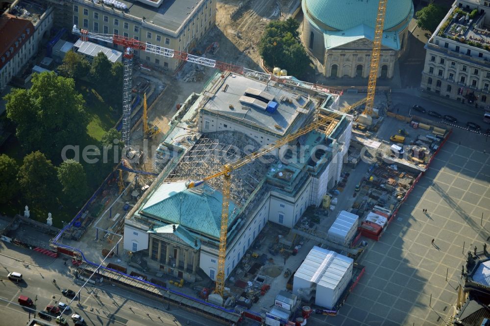 Berlin from the bird's eye view: View of the reconstruction and renovation of the building of the Staatsoper Unter den Linden in Berlin at Bebelplatz. It is the oldest opera house and theater building in Berlin. According to the architect HG Merz is a reconstruction of the historical building complex