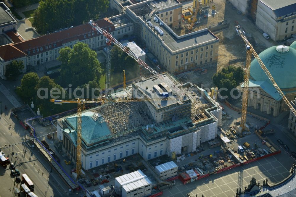 Aerial image Berlin - View of the reconstruction and renovation of the building of the Staatsoper Unter den Linden in Berlin at Bebelplatz. It is the oldest opera house and theater building in Berlin. According to the architect HG Merz is a reconstruction of the historical building complex