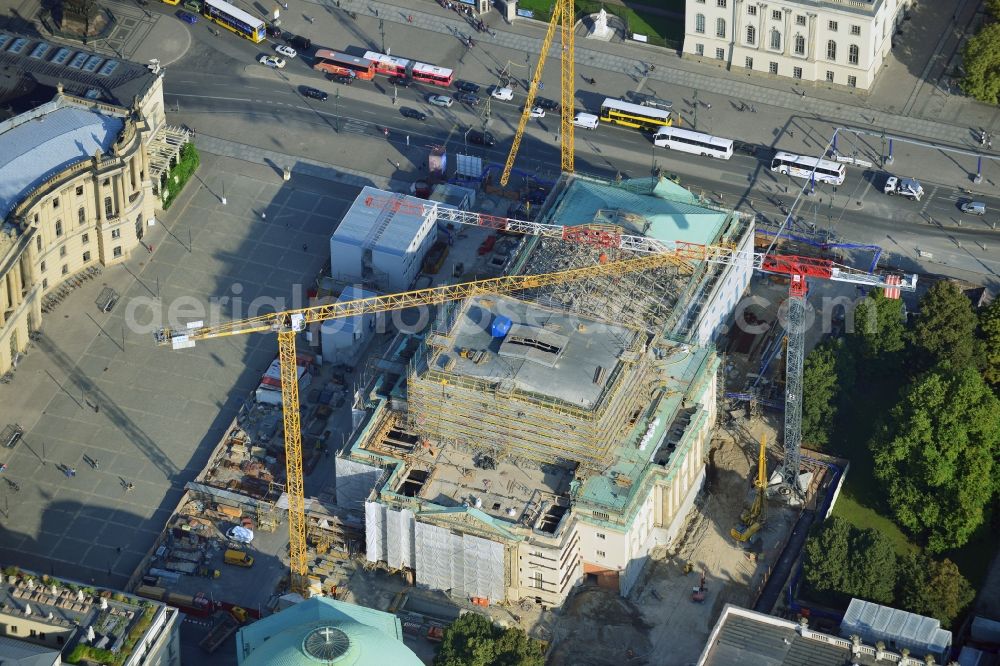 Berlin from the bird's eye view: View of the reconstruction and renovation of the building of the Staatsoper Unter den Linden in Berlin at Bebelplatz. It is the oldest opera house and theater building in Berlin. According to the architect HG Merz is a reconstruction of the historical building complex