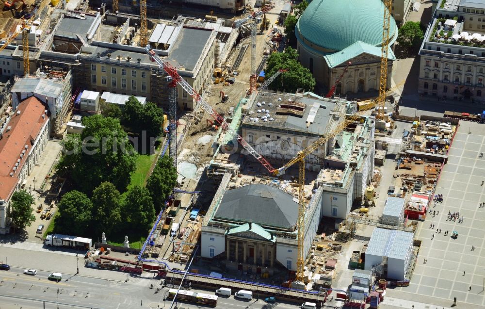 Aerial photograph Berlin - View of the reconstruction and renovation of the building of the Staatsoper Unter den Linden in Berlin at Bebelplatz. It is the oldest opera house and theater building in Berlin. According to the architect HG Merz is a reconstruction of the historical building complex