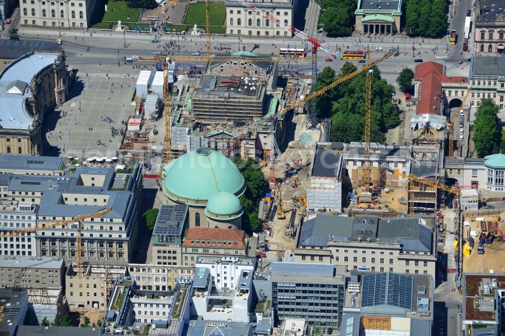 Berlin from above - View of the reconstruction and renovation of the building of the Staatsoper Unter den Linden in Berlin at Bebelplatz. It is the oldest opera house and theater building in Berlin. According to the architect HG Merz is a reconstruction of the historical building complex