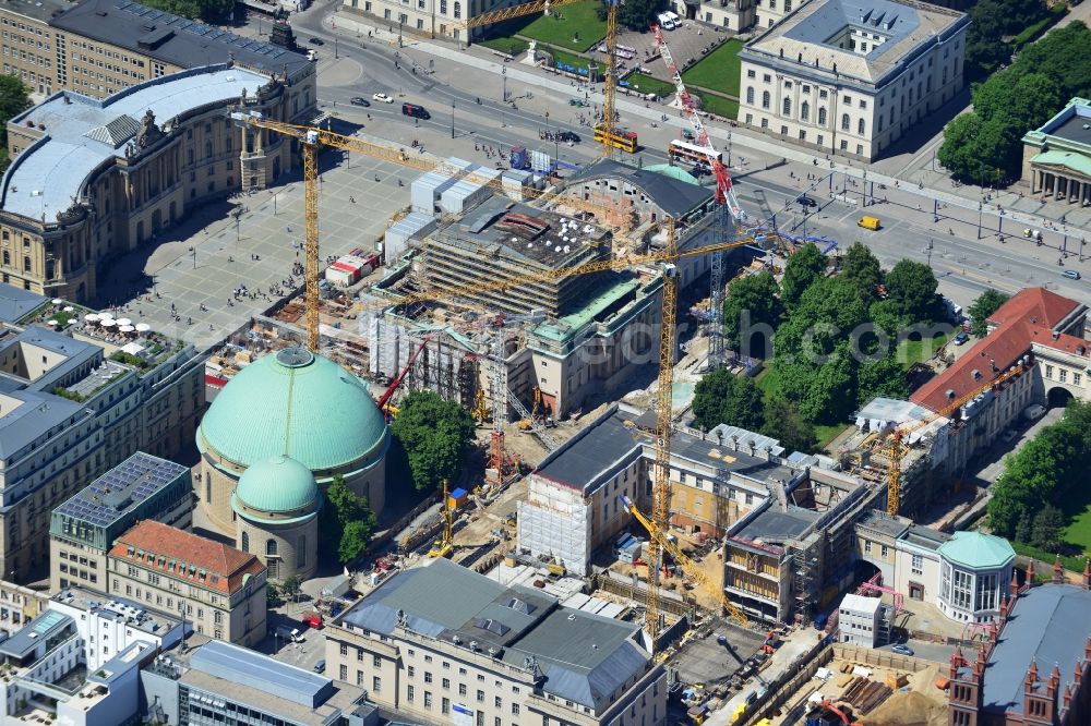 Berlin from the bird's eye view: View of the reconstruction and renovation of the building of the Staatsoper Unter den Linden in Berlin at Bebelplatz. It is the oldest opera house and theater building in Berlin. According to the architect HG Merz is a reconstruction of the historical building complex