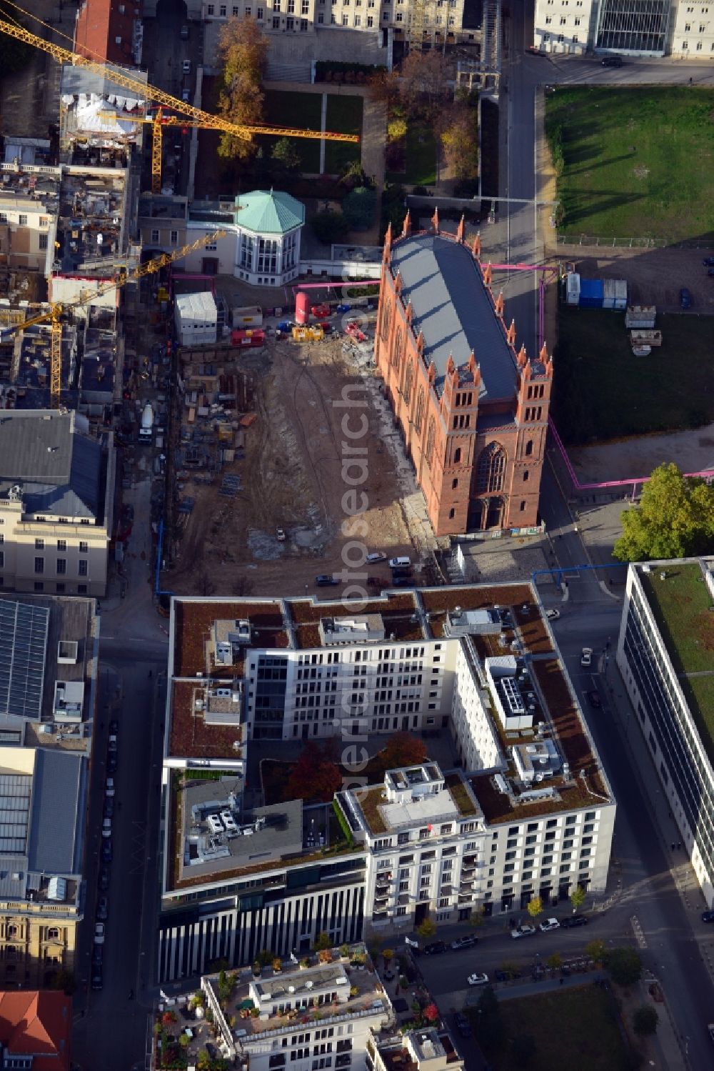 Aerial photograph Berlin - View of the reconstruction and renovation of the building of the Staatsoper Unter den Linden in Berlin at Bebelplatz. It is the oldest opera house and theater building in Berlin. A new building will serve as stacks and warehouse for the Staatsoper Komplex. The architect HG Merz is a overseeing the reconstruction of the historical building complex