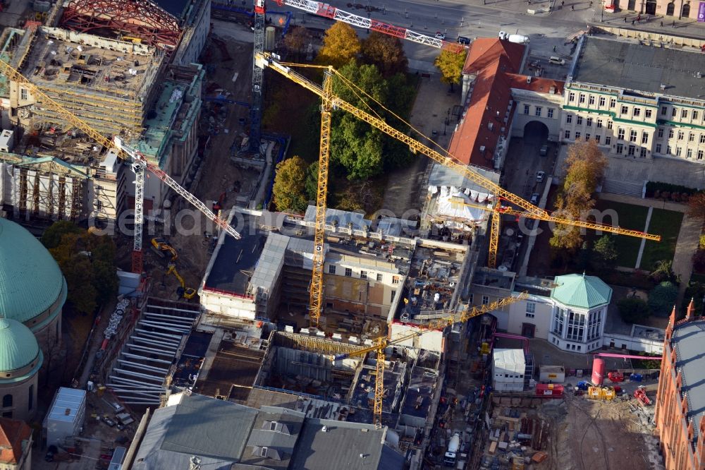 Berlin from above - View of the reconstruction and renovation of the building of the Staatsoper Unter den Linden in Berlin at Bebelplatz. It is the oldest opera house and theater building in Berlin. A new building will serve as stacks and warehouse for the Staatsoper Komplex. The architect HG Merz is a overseeing the reconstruction of the historical building complex