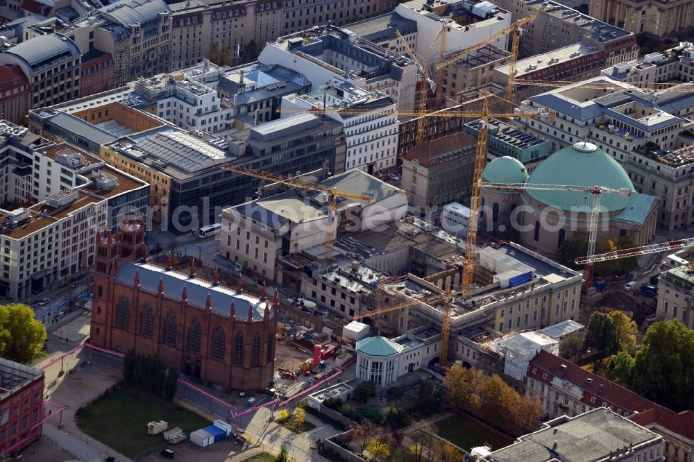 Aerial photograph Berlin - View of the reconstruction and renovation of the building of the Staatsoper Unter den Linden in Berlin at Bebelplatz. It is the oldest opera house and theater building in Berlin. A new building will serve as stacks and warehouse for the Staatsoper Komplex. The architect HG Merz is a overseeing the reconstruction of the historical building complex