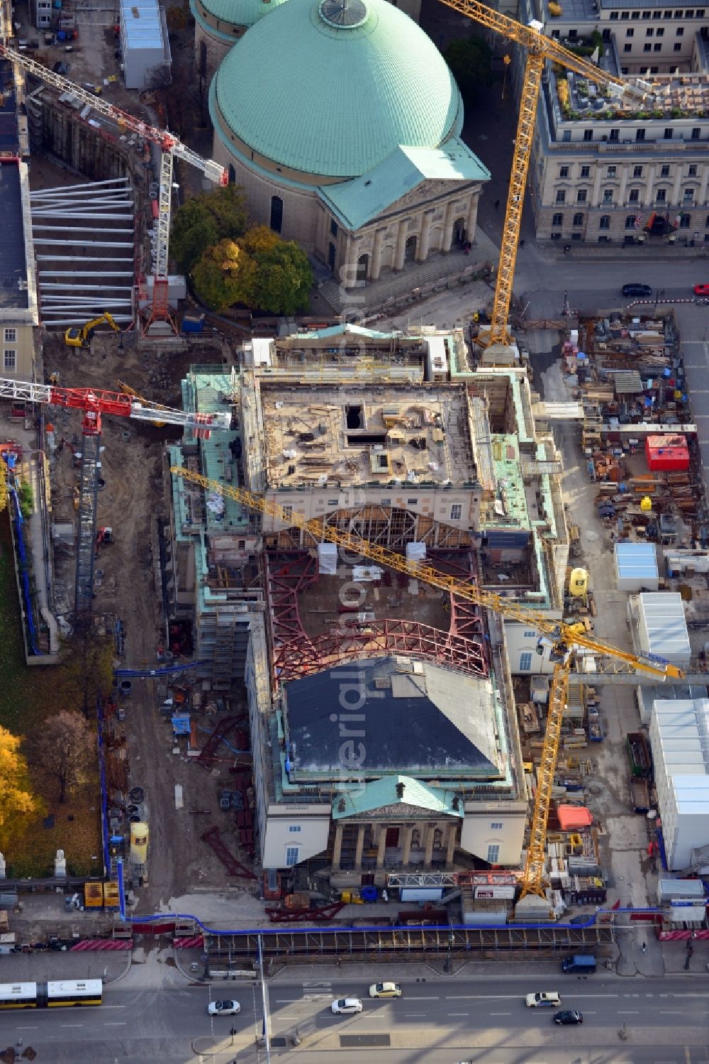 Aerial image Berlin - View of the reconstruction and renovation of the building of the Staatsoper Unter den Linden in Berlin at Bebelplatz. It is the oldest opera house and theater building in Berlin. A new building will serve as stacks and warehouse for the Staatsoper Komplex. The architect HG Merz is a overseeing the reconstruction of the historical building complex