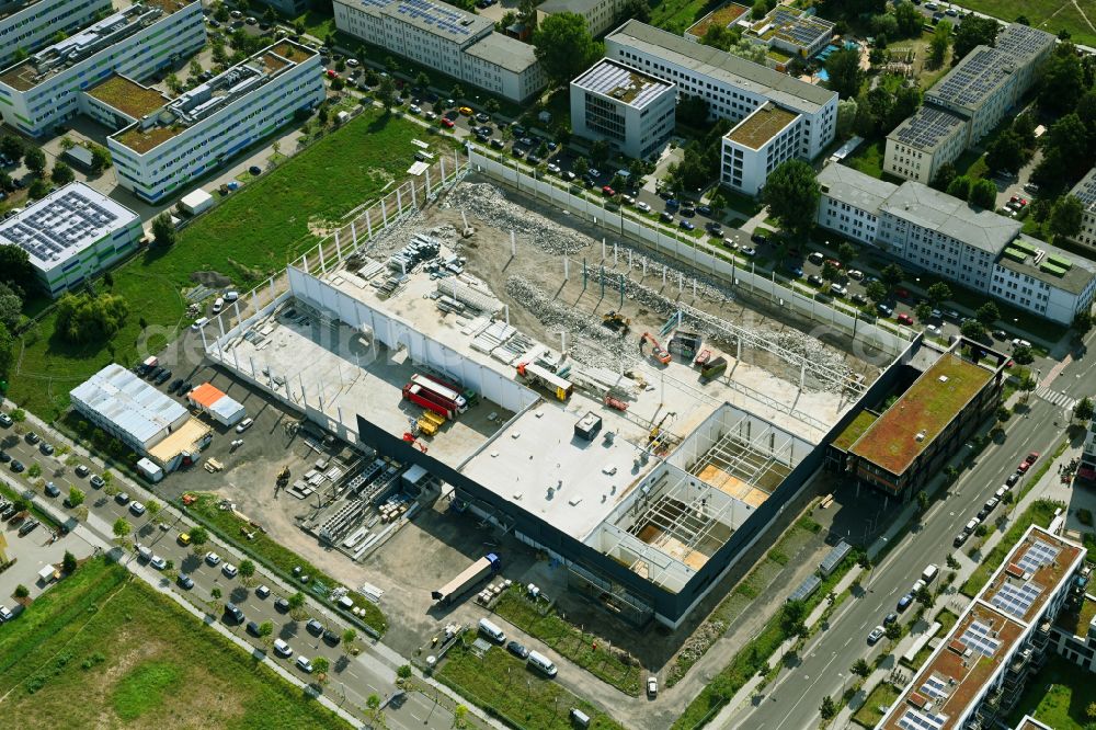 Aerial photograph Berlin - Construction site for the conversion of the buildings and production halls on the factory premises of Soltecture GmbH at Gross-Berliner Damm - Pfarrer-Goosmann-Strasse - Georg-Schendel-Strasse in Berlin, Germany