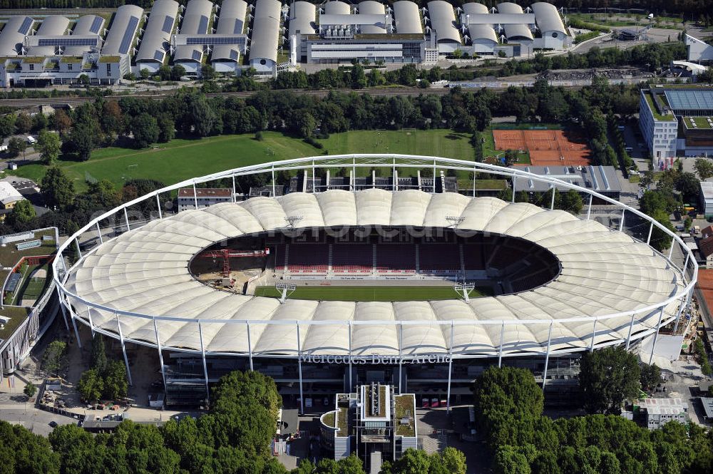 Aerial photograph Stuttgart - Blick auf die Umbauarbeiten am Stadion Stuttgart( Mercedes-Benz-Arena) zu einem reinen Fußballstadion. Während des Umbaus, Bauherr ist die Stadion NeckarPark GmbH & Co. KG, wird sich die Kapazität auf 39.000 Plätze reduzieren, die Kosten des Projekts belaufen sich auf rund 60 Millionen Euro. Für zusätzliche 13,15 Millionen Euro wird außerdem unter der Untertürkheimer Kurve eine Sporthalle entstehen. Ausführende Firma ist die BAM Deutschland AG. View of the reconstruction of the stadium Stuttgart (Mercedes-Benz-Arena) to a football-only stadium.