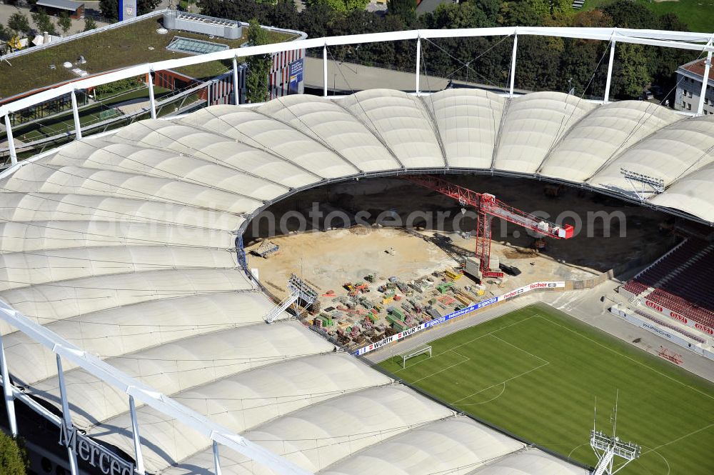 Stuttgart from above - Blick auf die Umbauarbeiten am Stadion Stuttgart( Mercedes-Benz-Arena) zu einem reinen Fußballstadion. Während des Umbaus, Bauherr ist die Stadion NeckarPark GmbH & Co. KG, wird sich die Kapazität auf 39.000 Plätze reduzieren, die Kosten des Projekts belaufen sich auf rund 60 Millionen Euro. Für zusätzliche 13,15 Millionen Euro wird außerdem unter der Untertürkheimer Kurve eine Sporthalle entstehen. Ausführende Firma ist die BAM Deutschland AG. View of the reconstruction of the stadium Stuttgart (Mercedes-Benz-Arena) to a football-only stadium.