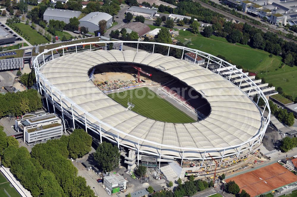 Aerial image Stuttgart - Blick auf die Umbauarbeiten am Stadion Stuttgart( Mercedes-Benz-Arena) zu einem reinen Fußballstadion. Während des Umbaus, Bauherr ist die Stadion NeckarPark GmbH & Co. KG, wird sich die Kapazität auf 39.000 Plätze reduzieren, die Kosten des Projekts belaufen sich auf rund 60 Millionen Euro. Für zusätzliche 13,15 Millionen Euro wird außerdem unter der Untertürkheimer Kurve eine Sporthalle entstehen. Ausführende Firma ist die BAM Deutschland AG. View of the reconstruction of the stadium Stuttgart (Mercedes-Benz-Arena) to a football-only stadium.