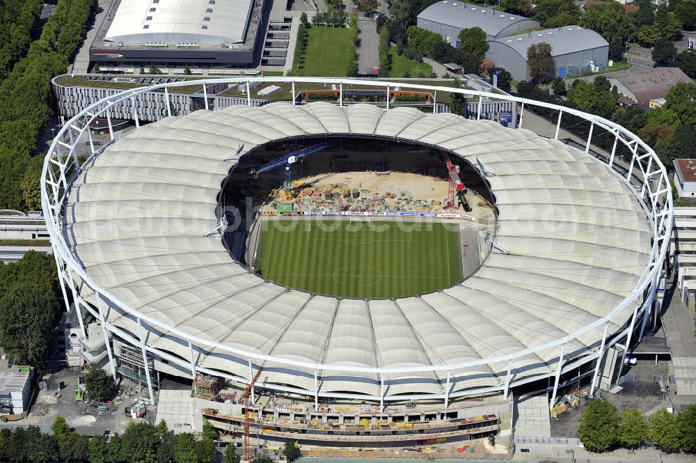 Stuttgart from above - Blick auf die Umbauarbeiten am Stadion Stuttgart( Mercedes-Benz-Arena) zu einem reinen Fußballstadion. Während des Umbaus, Bauherr ist die Stadion NeckarPark GmbH & Co. KG, wird sich die Kapazität auf 39.000 Plätze reduzieren, die Kosten des Projekts belaufen sich auf rund 60 Millionen Euro. Für zusätzliche 13,15 Millionen Euro wird außerdem unter der Untertürkheimer Kurve eine Sporthalle entstehen. Ausführende Firma ist die BAM Deutschland AG. View of the reconstruction of the stadium Stuttgart (Mercedes-Benz-Arena) to a football-only stadium.