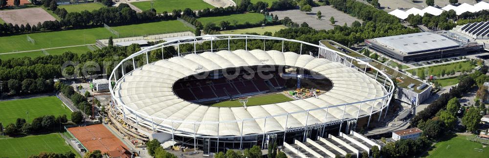 Aerial photograph Stuttgart - Blick auf die Umbauarbeiten am Stadion Stuttgart( Mercedes-Benz-Arena) zu einem reinen Fußballstadion. Während des Umbaus, Bauherr ist die Stadion NeckarPark GmbH & Co. KG, wird sich die Kapazität auf 39.000 Plätze reduzieren, die Kosten des Projekts belaufen sich auf rund 60 Millionen Euro. Für zusätzliche 13,15 Millionen Euro wird außerdem unter der Untertürkheimer Kurve eine Sporthalle entstehen. Ausführende Firma ist die BAM Deutschland AG. View of the reconstruction of the stadium Stuttgart (Mercedes-Benz-Arena) to a football-only stadium.