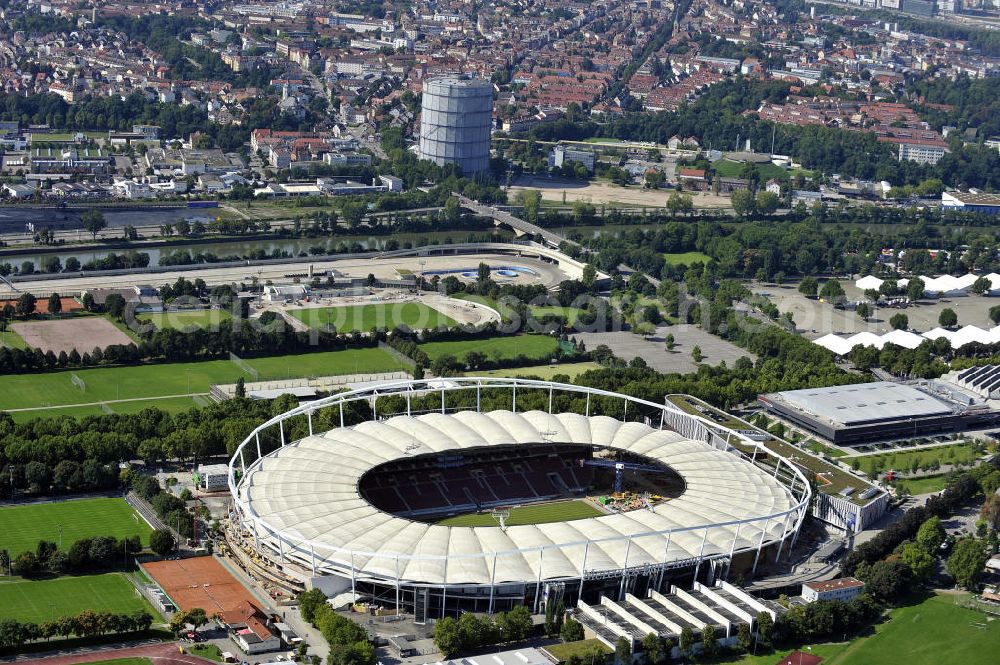 Stuttgart from above - Blick auf die Umbauarbeiten am Stadion Stuttgart( Mercedes-Benz-Arena) zu einem reinen Fußballstadion. Während des Umbaus, Bauherr ist die Stadion NeckarPark GmbH & Co. KG, wird sich die Kapazität auf 39.000 Plätze reduzieren, die Kosten des Projekts belaufen sich auf rund 60 Millionen Euro. Für zusätzliche 13,15 Millionen Euro wird außerdem unter der Untertürkheimer Kurve eine Sporthalle entstehen. Ausführende Firma ist die BAM Deutschland AG. View of the reconstruction of the stadium Stuttgart (Mercedes-Benz-Arena) to a football-only stadium.