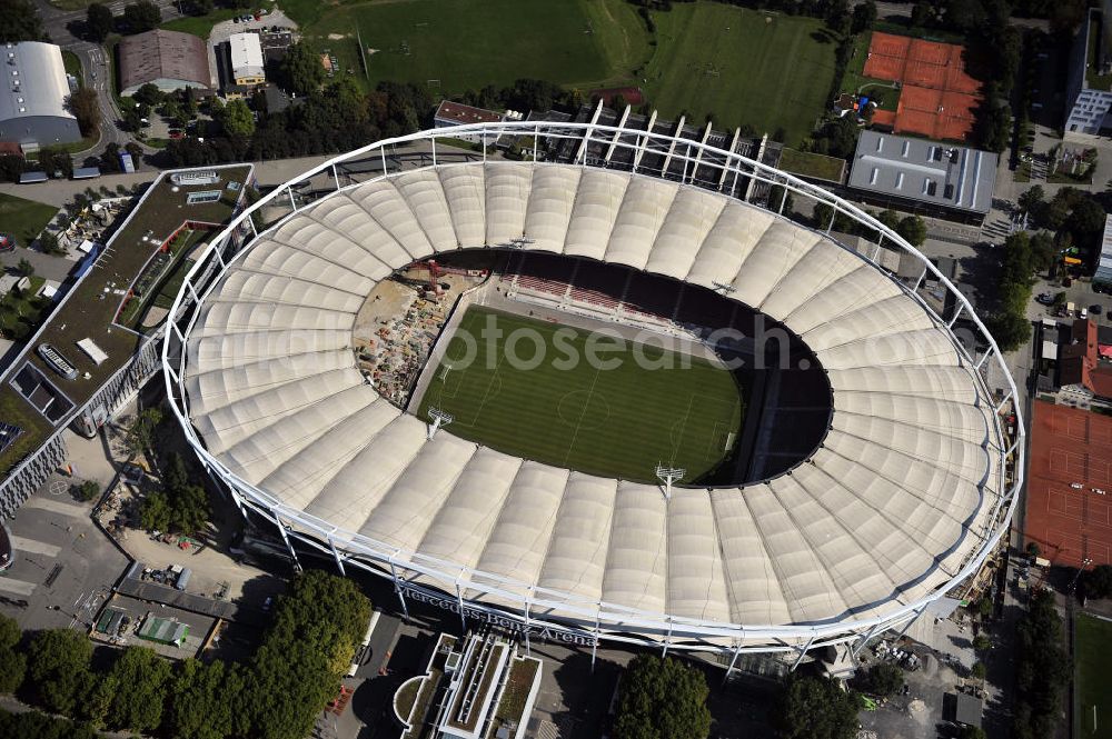 Aerial photograph Stuttgart - Blick auf die Umbauarbeiten am Stadion Stuttgart( Mercedes-Benz-Arena) zu einem reinen Fußballstadion. Während des Umbaus, Bauherr ist die Stadion NeckarPark GmbH & Co. KG, wird sich die Kapazität auf 39.000 Plätze reduzieren, die Kosten des Projekts belaufen sich auf rund 60 Millionen Euro. Für zusätzliche 13,15 Millionen Euro wird außerdem unter der Untertürkheimer Kurve eine Sporthalle entstehen. Ausführende Firma ist die BAM Deutschland AG. View of the reconstruction of the stadium Stuttgart (Mercedes-Benz-Arena) to a football-only stadium.