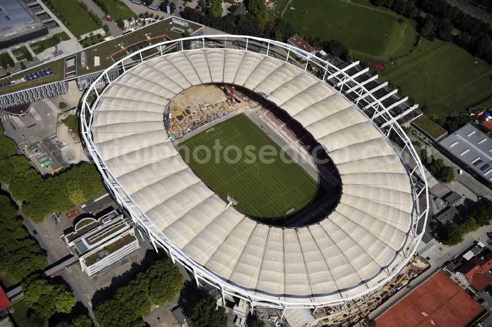 Stuttgart from above - Blick auf die Umbauarbeiten am Stadion Stuttgart( Mercedes-Benz-Arena) zu einem reinen Fußballstadion. Während des Umbaus, Bauherr ist die Stadion NeckarPark GmbH & Co. KG, wird sich die Kapazität auf 39.000 Plätze reduzieren, die Kosten des Projekts belaufen sich auf rund 60 Millionen Euro. Für zusätzliche 13,15 Millionen Euro wird außerdem unter der Untertürkheimer Kurve eine Sporthalle entstehen. Ausführende Firma ist die BAM Deutschland AG. View of the reconstruction of the stadium Stuttgart (Mercedes-Benz-Arena) to a football-only stadium.