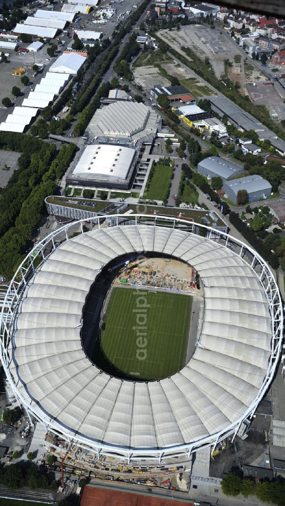 Stuttgart from above - Blick auf die Umbauarbeiten am Stadion Stuttgart( Mercedes-Benz-Arena) zu einem reinen Fußballstadion. Während des Umbaus, Bauherr ist die Stadion NeckarPark GmbH & Co. KG, wird sich die Kapazität auf 39.000 Plätze reduzieren, die Kosten des Projekts belaufen sich auf rund 60 Millionen Euro. Für zusätzliche 13,15 Millionen Euro wird außerdem unter der Untertürkheimer Kurve eine Sporthalle entstehen. Ausführende Firma ist die BAM Deutschland AG. View of the reconstruction of the stadium Stuttgart (Mercedes-Benz-Arena) to a football-only stadium.